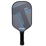 Tanso Zard Pickle Bat action shot: "Advanced player hitting a powerful shot with the Tanso Zard Pickle Bat on a pickleball court.