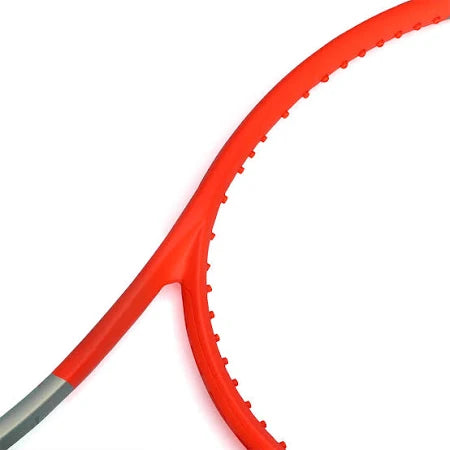 Detailed shot of the HEAD Radical S 2021 racquet grip, emphasizing the comfortable response and minimized vibration for extended play in a "misspell match." Shop now at ProBadminton.in.