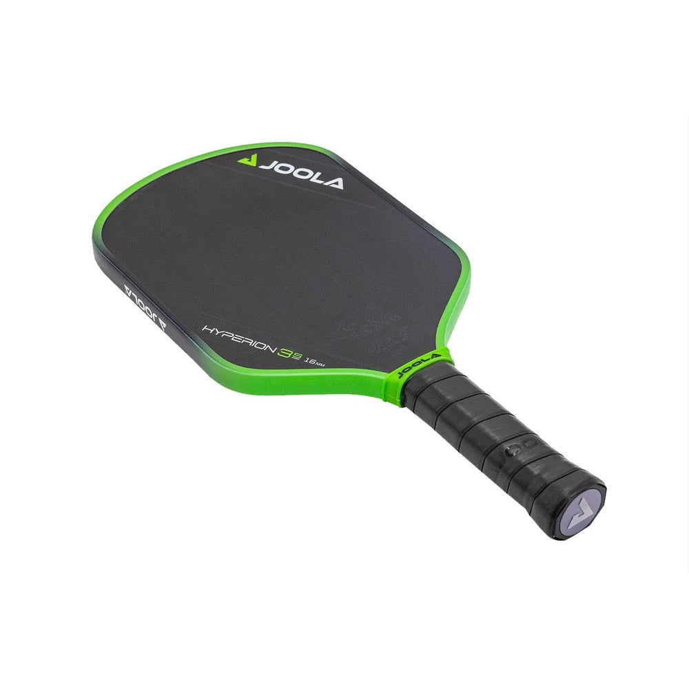 Hyperion 3S Paddle resting on net: "The Joola Ben Johns Hyperion 3S 16mm Pickleball Paddle elegantly placed on a pickleball court net."