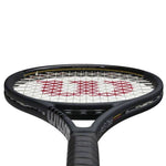 Close-up of the Wilson Pro Staff 97L V14 teniss racket's head, emphasizing its string pattern for smooth control and accuracy, found on ProBadminton.in.