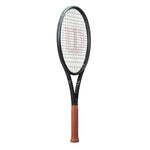 Player demonstrating aggressive, all-round play with the Wilson RF 01 Future tenniss racquet, ideal for pace, spin, and precision. Available on ProBadminton.in.