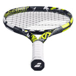 A developing tennis player demonstrating a fluid swing with the Babolat Pure Aero Lite (Babolat Pure Aerolite), highlighting its maneuverability.