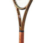 Detailed view of the grip of the Wilson Pro Staff 97L V14 tennis rackit, illustrating its comfortable hold for rapid movement.