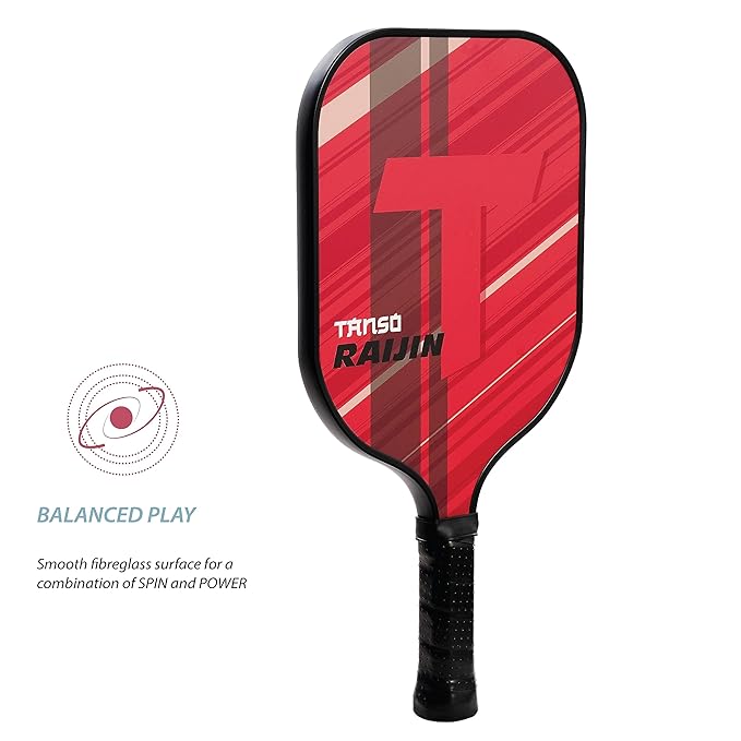 Beginner player holding Raijin paddle: "A new pickleball player, a beginner, confidently holding the Tanso Raijin Pickleball Bat."