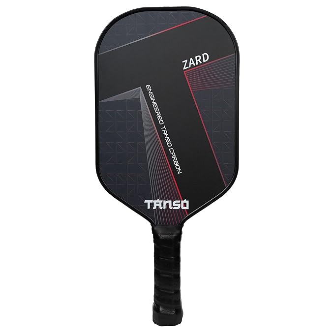 Close-up of Tanso Zard paddle surface: "Close-up detail of the roughened carbon graphite surface of the Tanso Zard Pickle Bat, highlighting its spin-enhancing texture.