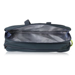 Open travel bag with clear compartment on a white background