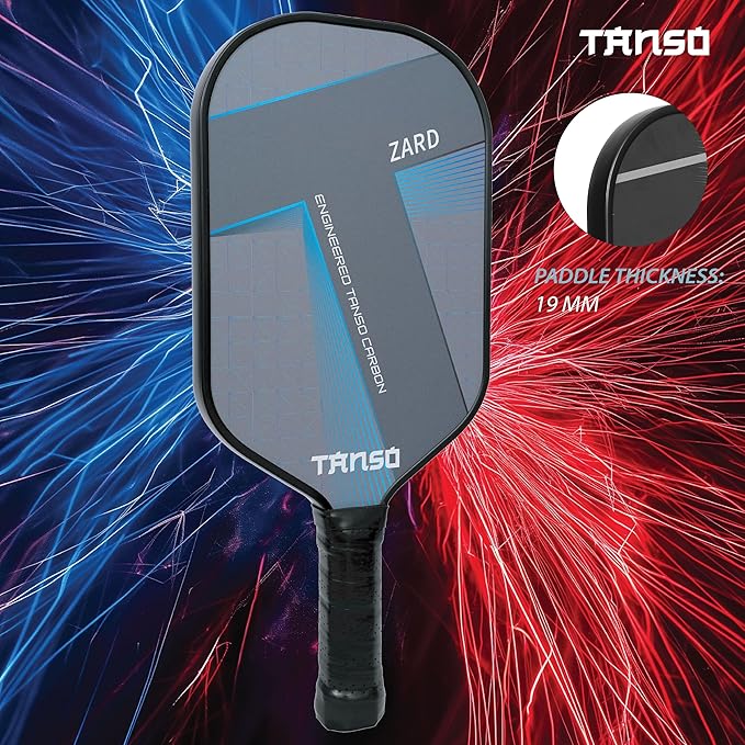 Tanso Zard Pickle Bat with a pickleball: "The Tanso Zard Pickle Bat placed next to a pickleball, ready for play."