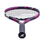 A new player confidently swinging the Babolat Boost Aero Pink (Babolat Boost Aero Pik) on court, showcasing its easy maneuverability, found on probadminton.in.