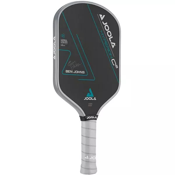 Close-up of Carbon Friction Surface: "Close-up of the Carbon Friction Surface (CFS) on the Joola Ben Johns Hyperion C2 CFS 16 Paddle, highlighting its textured finish for maximum spin."