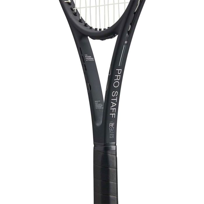 Alt Text: Action shot of an advanced player executing a powerful shot with the Wilson Pro Staff 97 Autograph tenniss racquet, demonstrating Federer-level control. Shop now at ProBadminton.in.