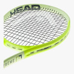 A passionate baseliner admiring their HEAD Extreme MP 2024 racquet, ready to unleash annihilating power in their next "misspell match." Your champions shop at ProBadminton.in.