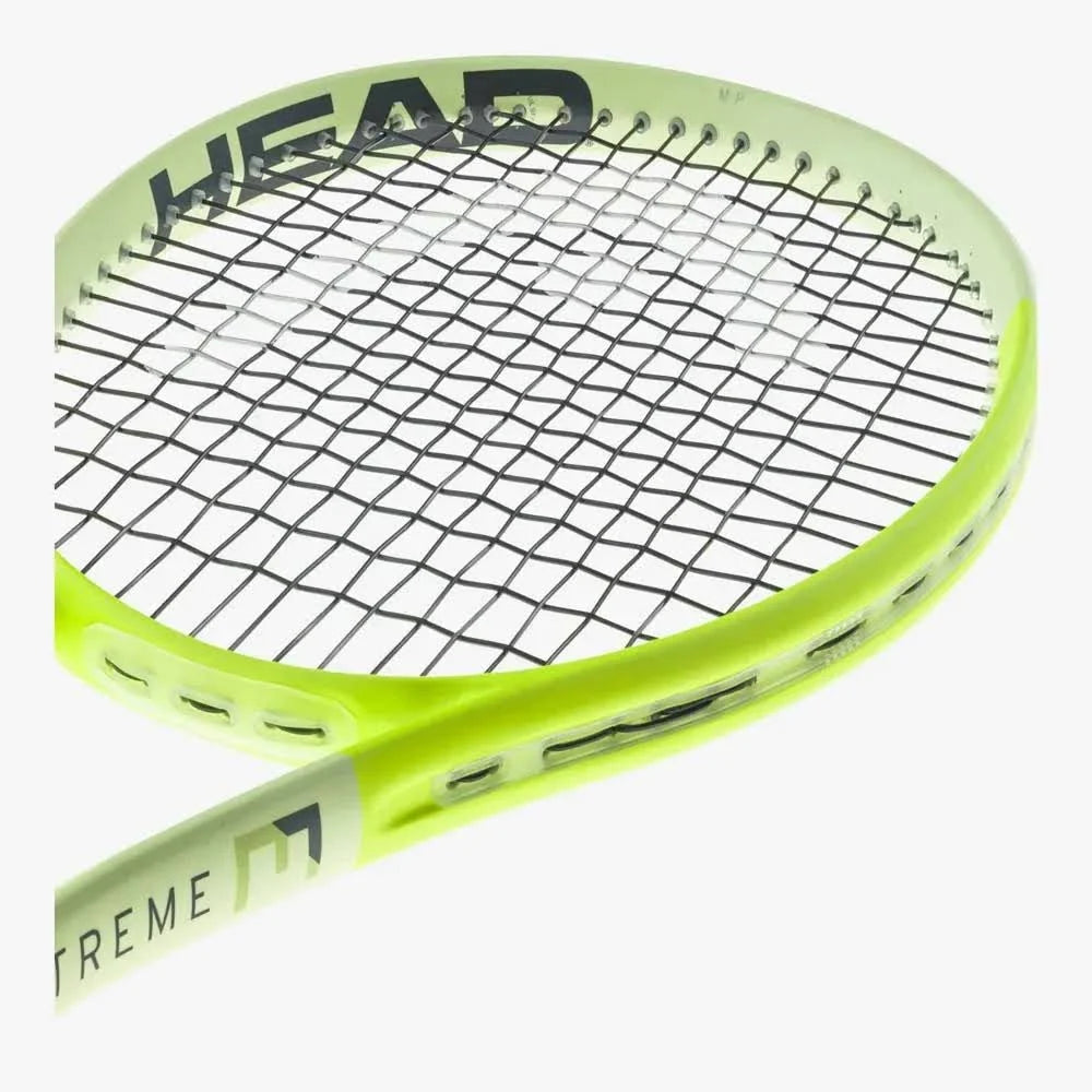A passionate baseliner admiring their HEAD Extreme MP 2024 racquet, ready to unleash annihilating power in their next "misspell match." Your champions shop at ProBadminton.in.