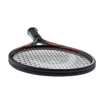 Player hitting backhand with Head Prestige MP: "Tennis player demonstrating excellent control on a backhand shot using the Head Prestige MP."

